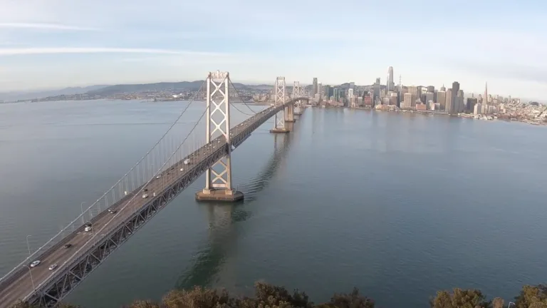 Aerial view of the San Francisco-Oakland Bay Bridge with very light traffic
