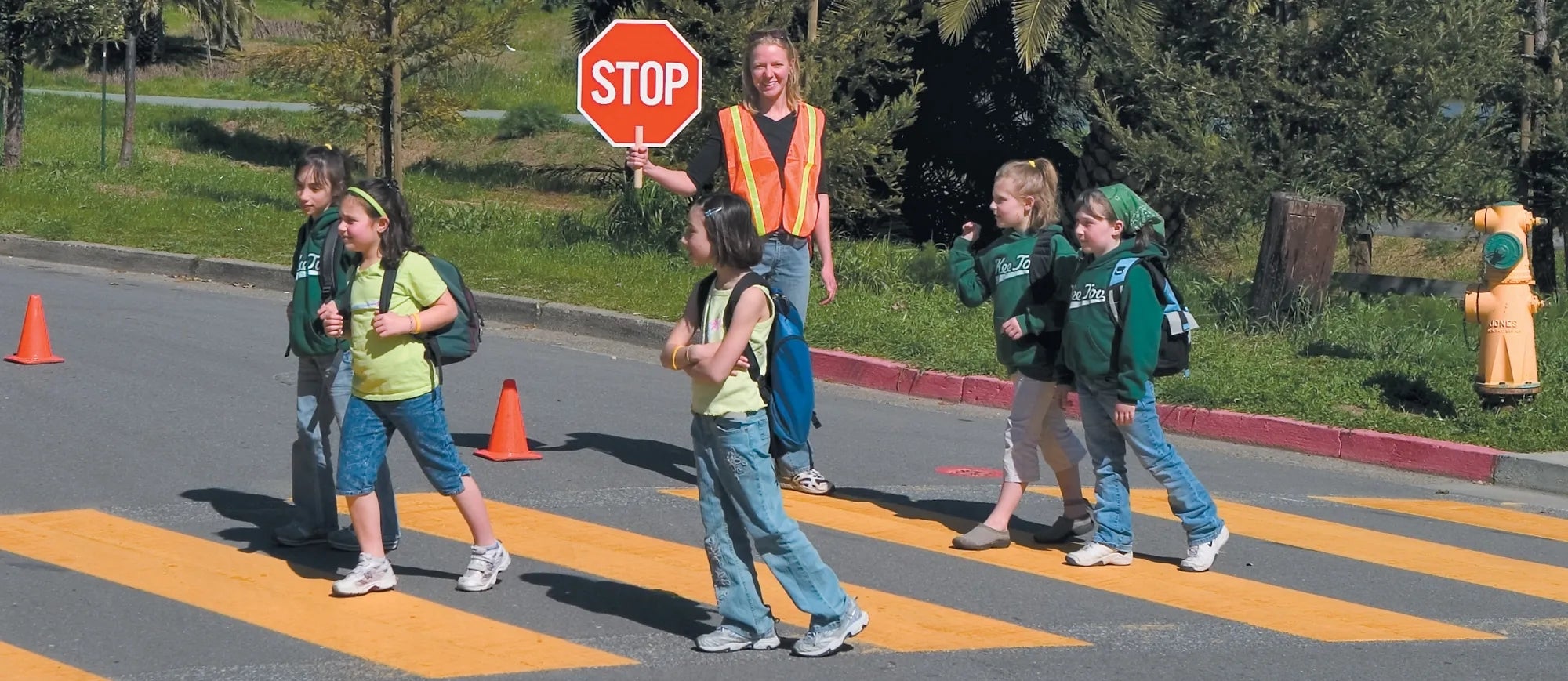 Kids in crosswalk on their way to school