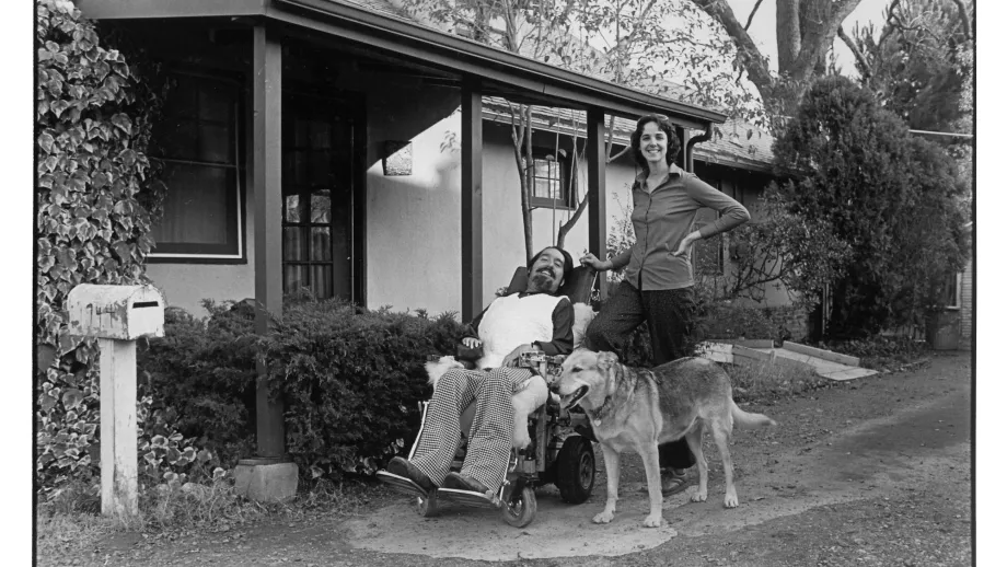 Ed and his wife, Cathy, and their dog Tremor outside their home in Sacramento.