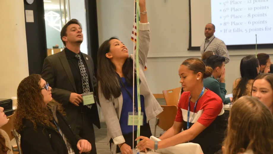 The day's events included a competition to build the tallest freestanding tower from a single sheet of paper.