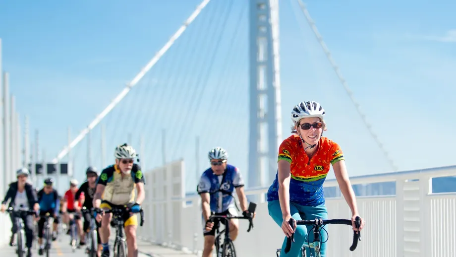 Bicyclists riding on east span path