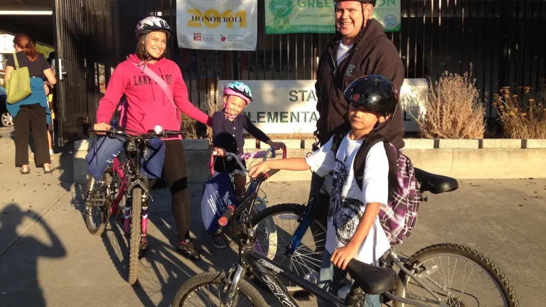 A family biking to school
