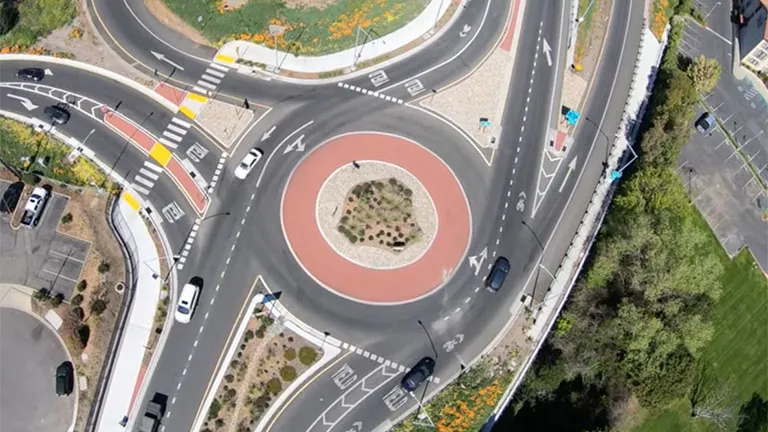 Aerial of a roundabout intersection.
