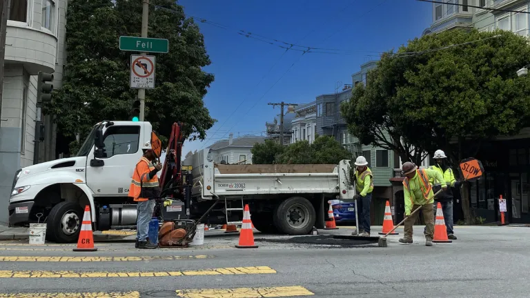 A road crew doing street repair in San Francisco.