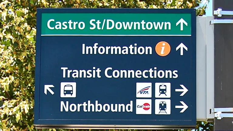 Wayfinding sign with arrows for Information, Transit Connections and more.
