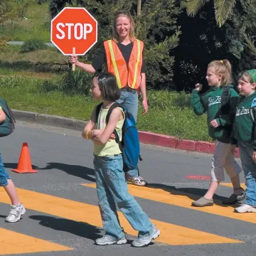 Kids in crosswalk on their way to school