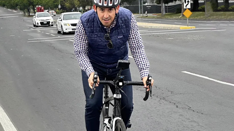 MTC Chair Alfredo Pedroza riding his bicycle on Bike to Work Day.