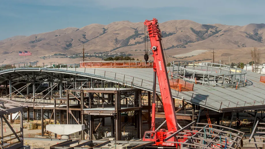 Milpitas BART Station: Crews work on the frame and roof of the station.