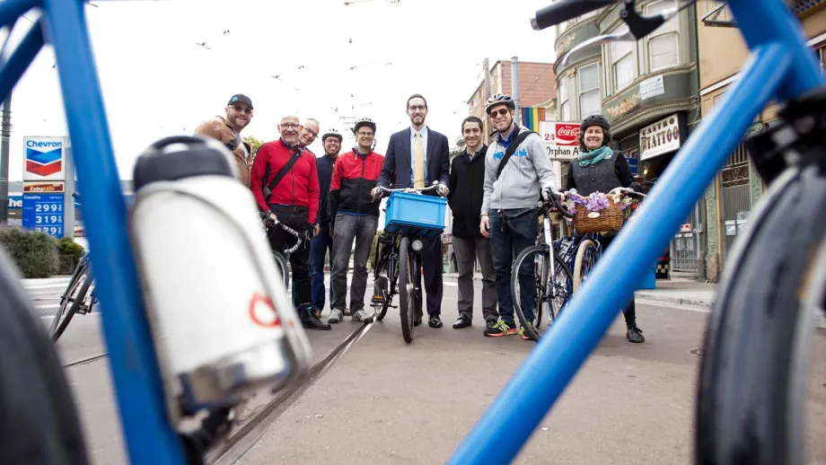 Commissioner Scott Wiener poses for the camera with a group of cyclists