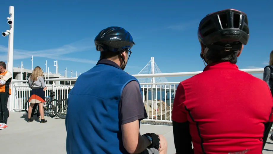 Cyclists take in the view at Yerba Buena Island.