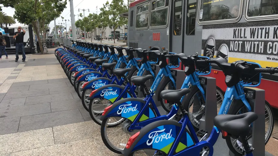 Line of go bikes on a stand