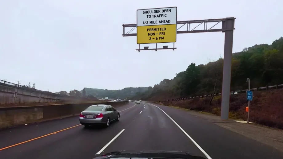Road signs similar to this one will notify motorists approaching the Richmond-San Rafael Bridge from Marin County when the proposed peak-hour eastbound lane -- now a shoulder -- is open to traffic.