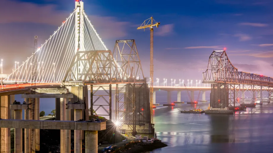night shot of demolition of old East Span with Bay Lights
