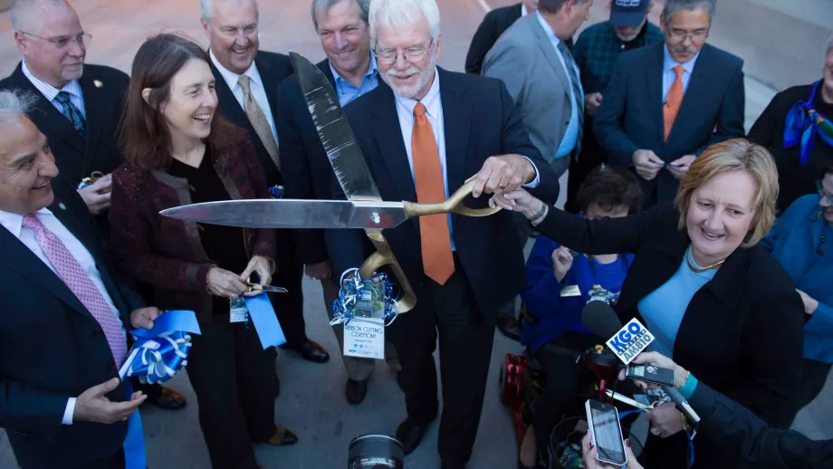 Congressman George Miller leads the Fourth Bore's ceremonial ribbon cutting. 