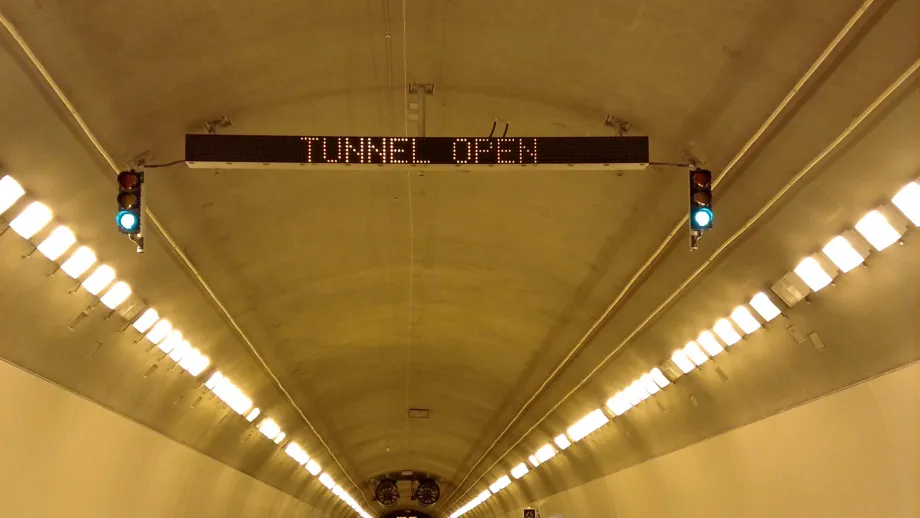 A road sign deep within the new bore bears a joyful message: "Tunnel Open."