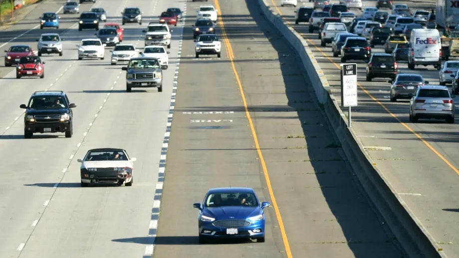 A car with FasTrak uses a Bay Area Express Lane to bypass traffic congestion.