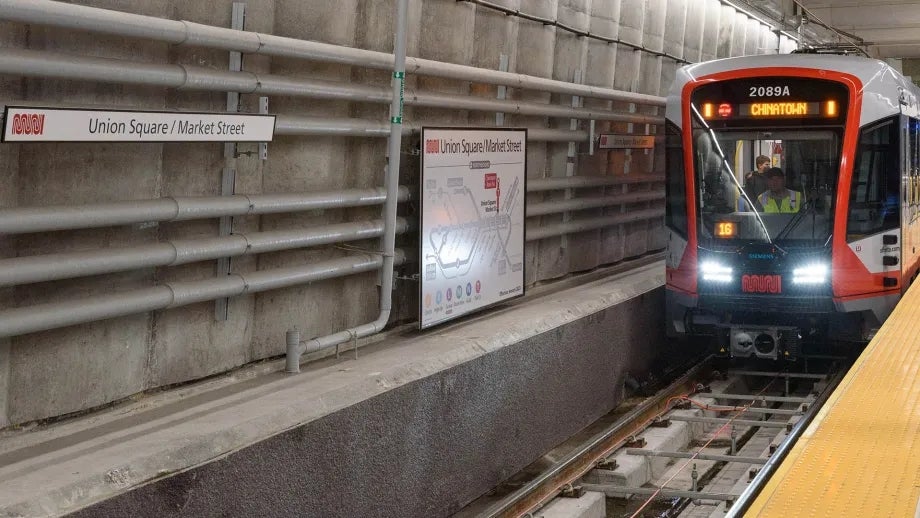 A new Muni train pulls into the Union Square/Market Street station that opened in 2023.