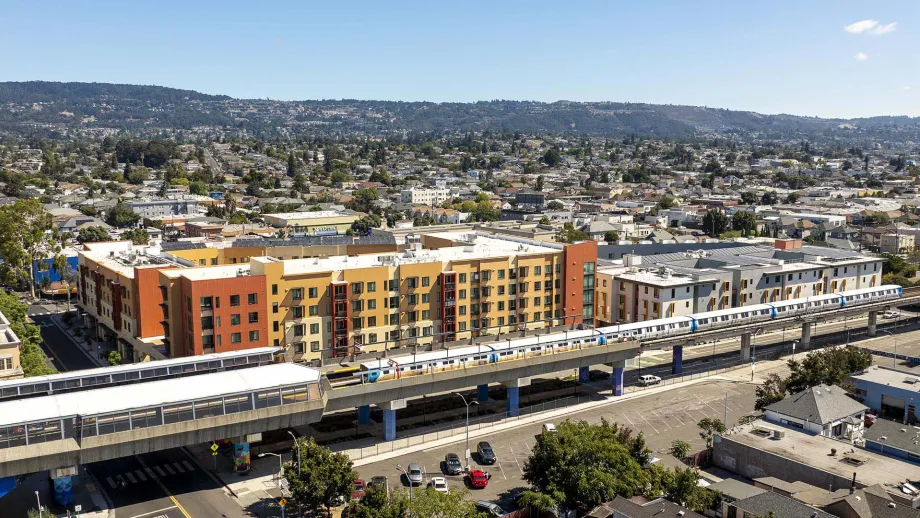 Aerial over apartment buildings at Fruitvale BART Station.