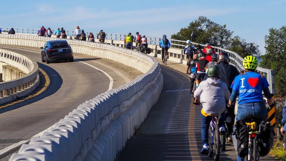 Cyclists exiting the Richmond-San Rafael bike/pedestrian path on an RSR Rides group bike ride.