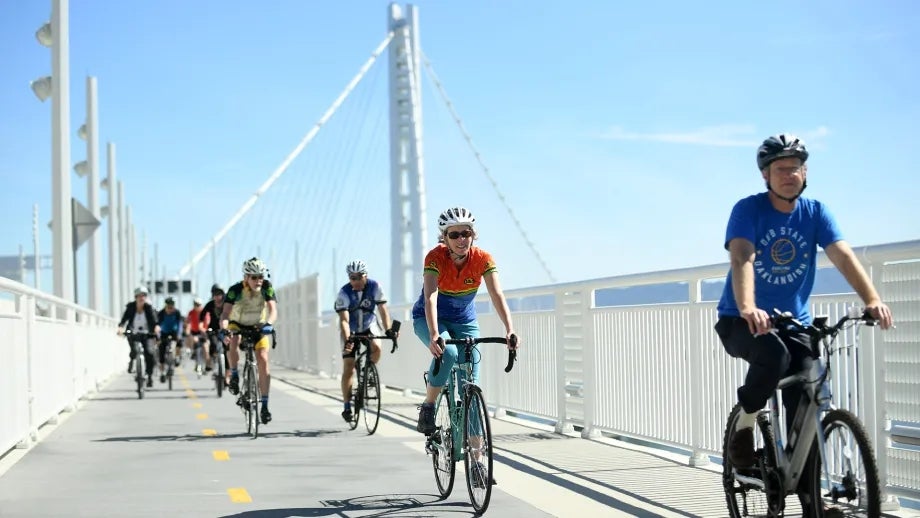 Cyclists riding on the bicycle/pedestrian path on the East Span of the San Francisco-Oakland Bay Bridge.