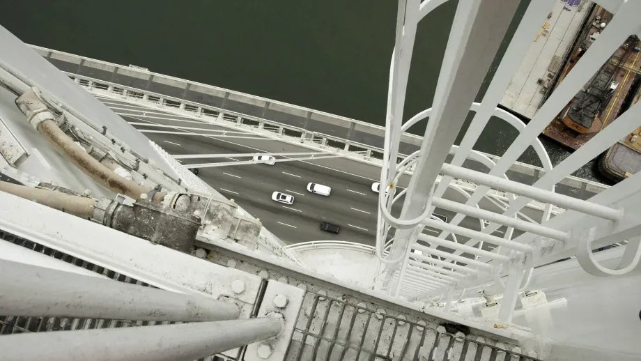 High-angle photo looking down at the water from the top of one of the towers of the new Bay Bridge East Span.