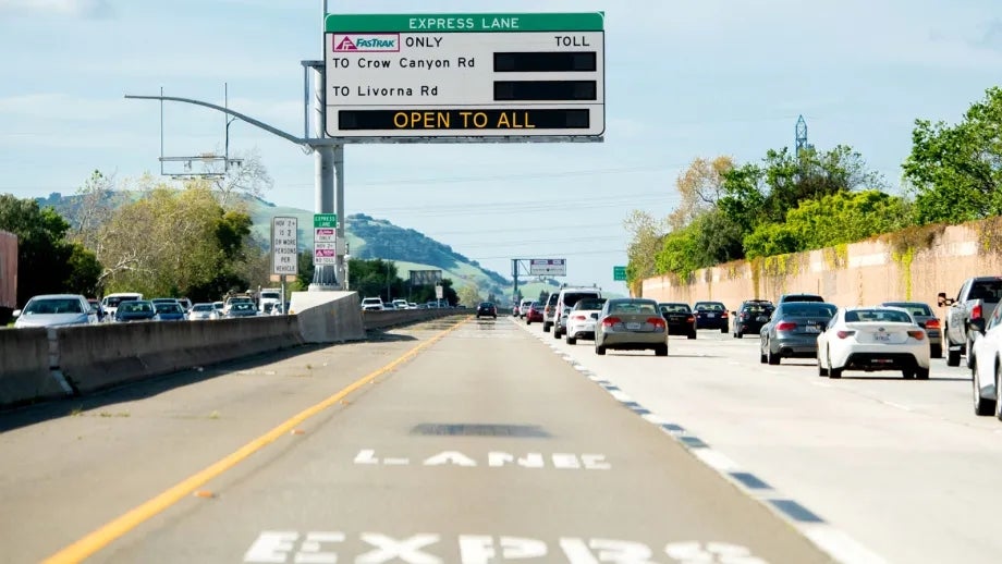 Express Lane sign reading OPEN TO ALL